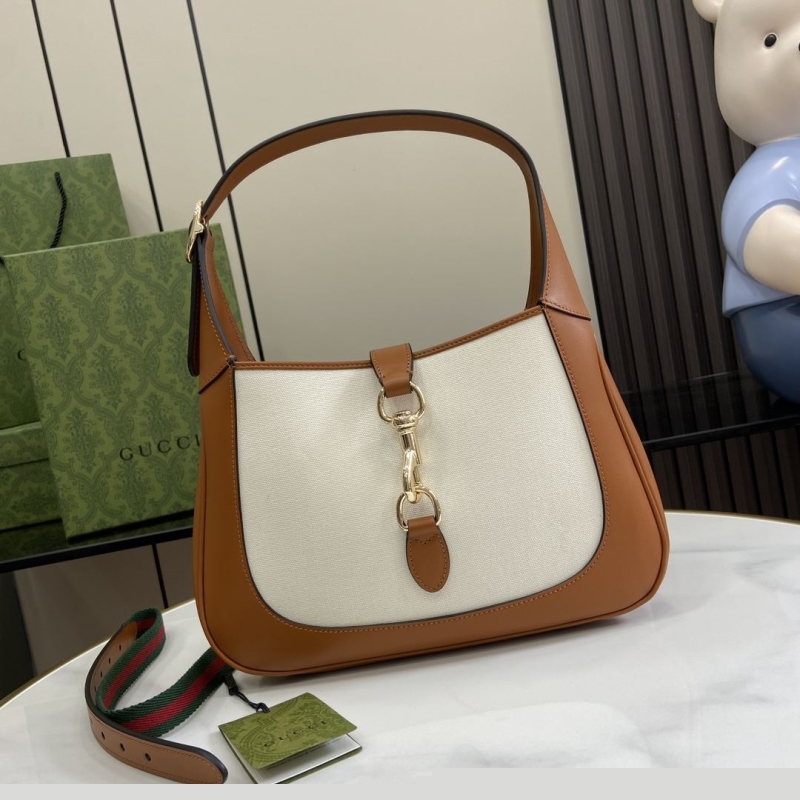 G*u*i top handle bags